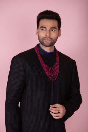Black pleated silk sherwani